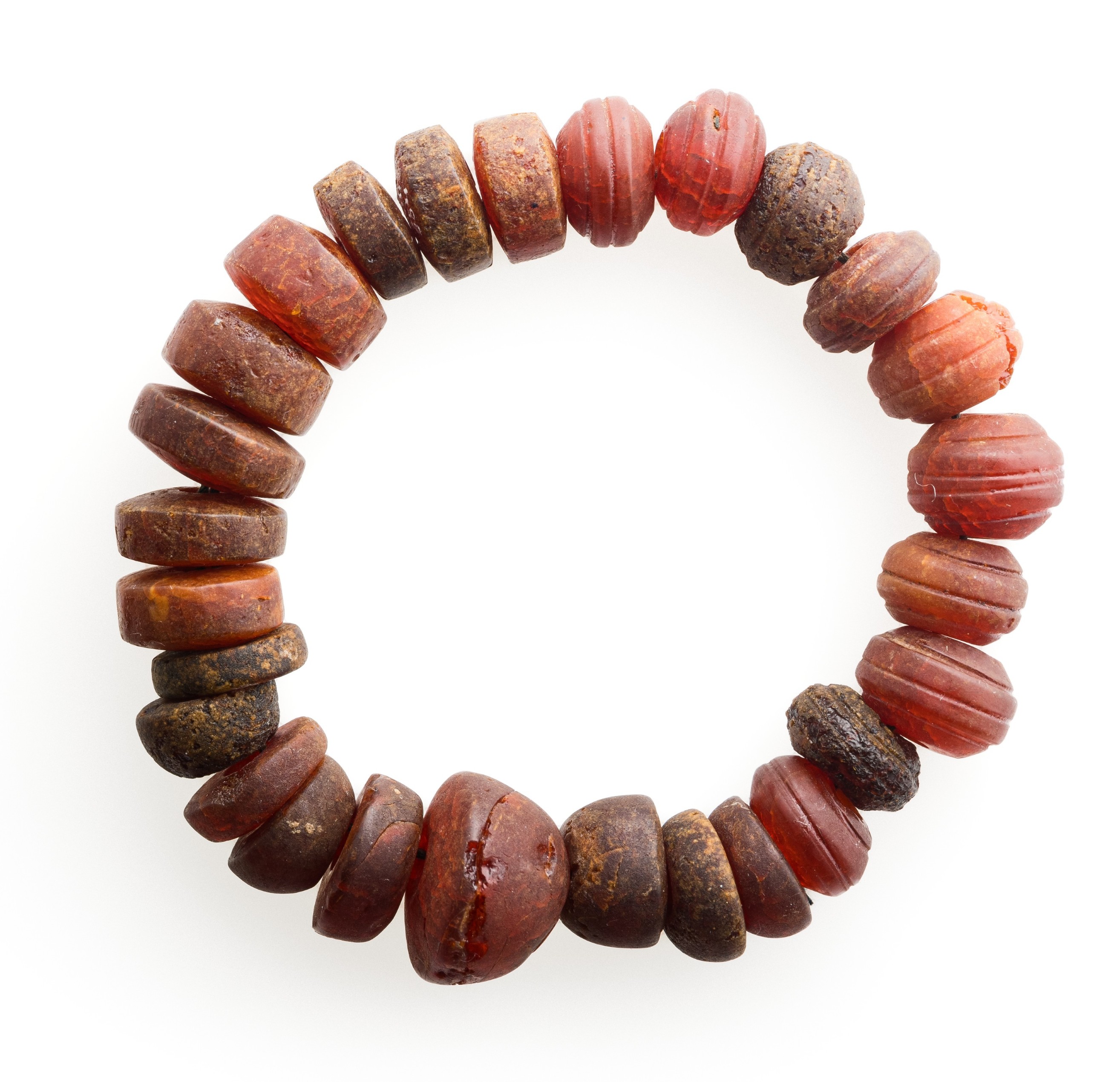 An accessory made of amber beads strung together in a circle