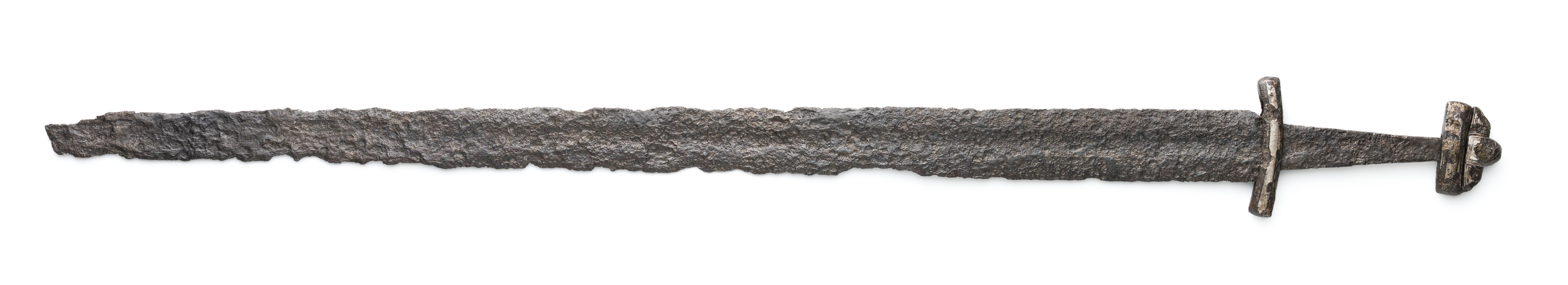 A rusty, double-edged metal sword